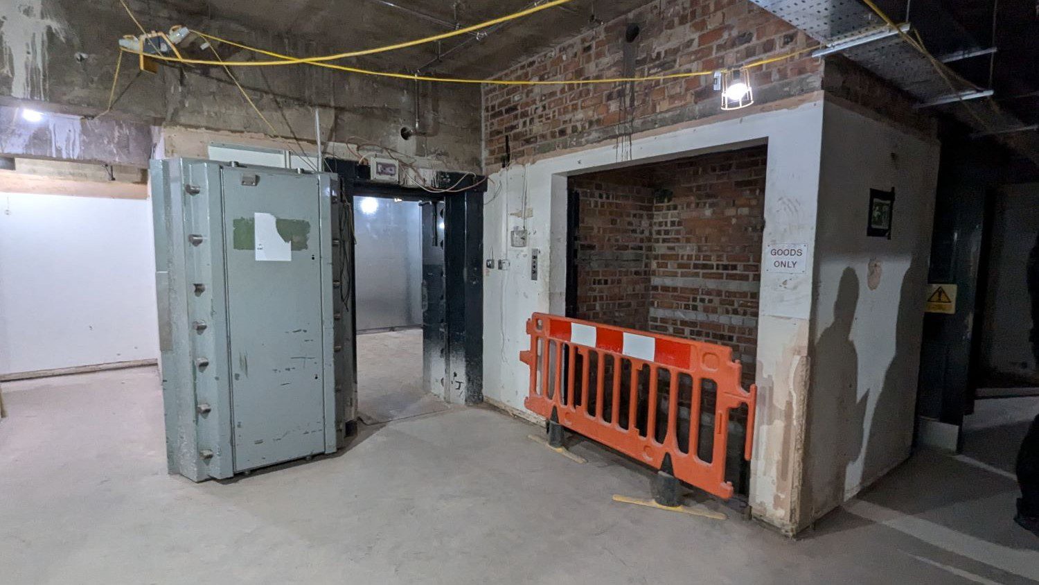 Vault door and elevator shaft
